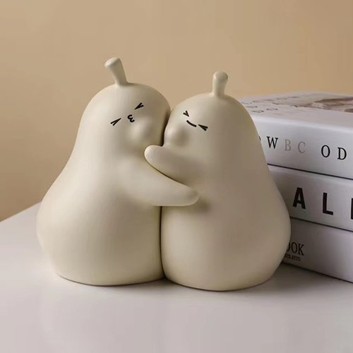 Linxia Pear Bookends Vanilla White Ceramic Creative Bookends for Shelves Book Holder Stopper for Books/Movies/CDs/Video Games (1 Pairs) Hug style
