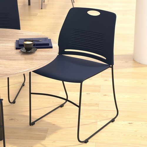 Flash Furniture HERCULES Series Commercial Stack Chair - 660 lb. Capacity - Durable Navy Perforated Plastic Back - Black Powder Coated Steel Sled Base