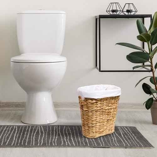 KOKODO Pack of 2 Oval Water Hyacinth Waste Basket ? Handwoven Wicker Trash Can with Handles & Metal Frame, BOHO Decorative Garbage Bin for Bathroom, Bedroom, Home Office (2-Pack)