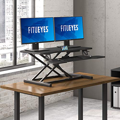 FITUEYES Height Adjustable Standing Desk 36¡± Wide Sit to Stand Converter Stand Up Desk Tabletop Workstation for Laptops Dual Monitor Riser Black SD309101WB