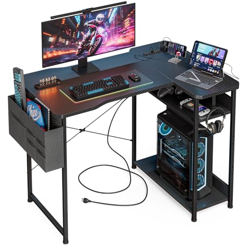 Small Gaming Desk with Power Outlets, 40 Inch L Shaped Desks with Reversible Shelves and Storage Bag,Computer Desk Corner Desk PC Desk for Gaming and Home Office Table,Black Carbon