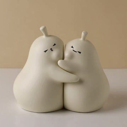 Linxia Pear Bookends Vanilla White Ceramic Creative Bookends for Shelves Book Holder Stopper for Books/Movies/CDs/Video Games (1 Pairs) Hug style