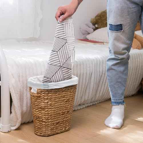 KOKODO Pack of 2 Oval Water Hyacinth Waste Basket ? Handwoven Wicker Trash Can with Handles & Metal Frame, BOHO Decorative Garbage Bin for Bathroom, Bedroom, Home Office (2-Pack)