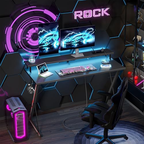 TIQLAB Gaming Desk with Power Outlets & LED 32 Inch Ergonomic Computer Carbon Fiber Surface Gamer Desk, Large Monitor Stand, Headphone Hook, PC Workstation for Bedroom, Black