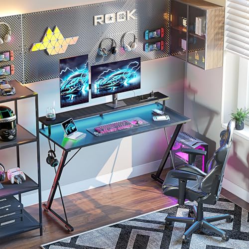 TIQLAB Gaming Desk with Power Outlets & LED 32 Inch Ergonomic Computer Carbon Fiber Surface Gamer Desk, Large Monitor Stand, Headphone Hook, PC Workstation for Bedroom, Black