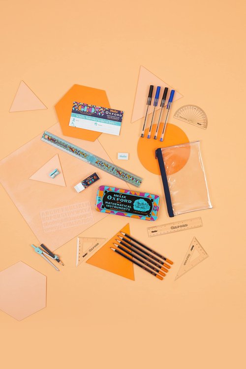 Helix Oxford Geo Complete Maths and Stationery Set - Oxford Maths Set, 30cm Folding Ruler, Ballpoint Pens, Eraser, Exam ready clear Pencil Case, Pencils - Orange Geometric Design